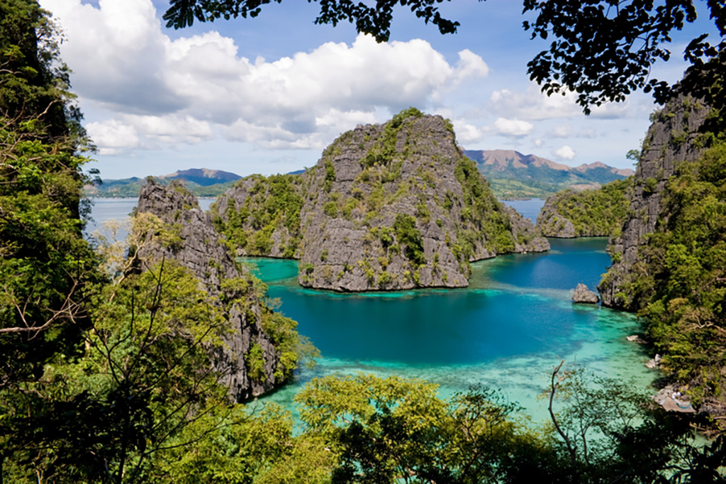 Landscape scenery of rock formations and a lagoon at Palawan, Philippines. Best Summer Destinations in Philippines